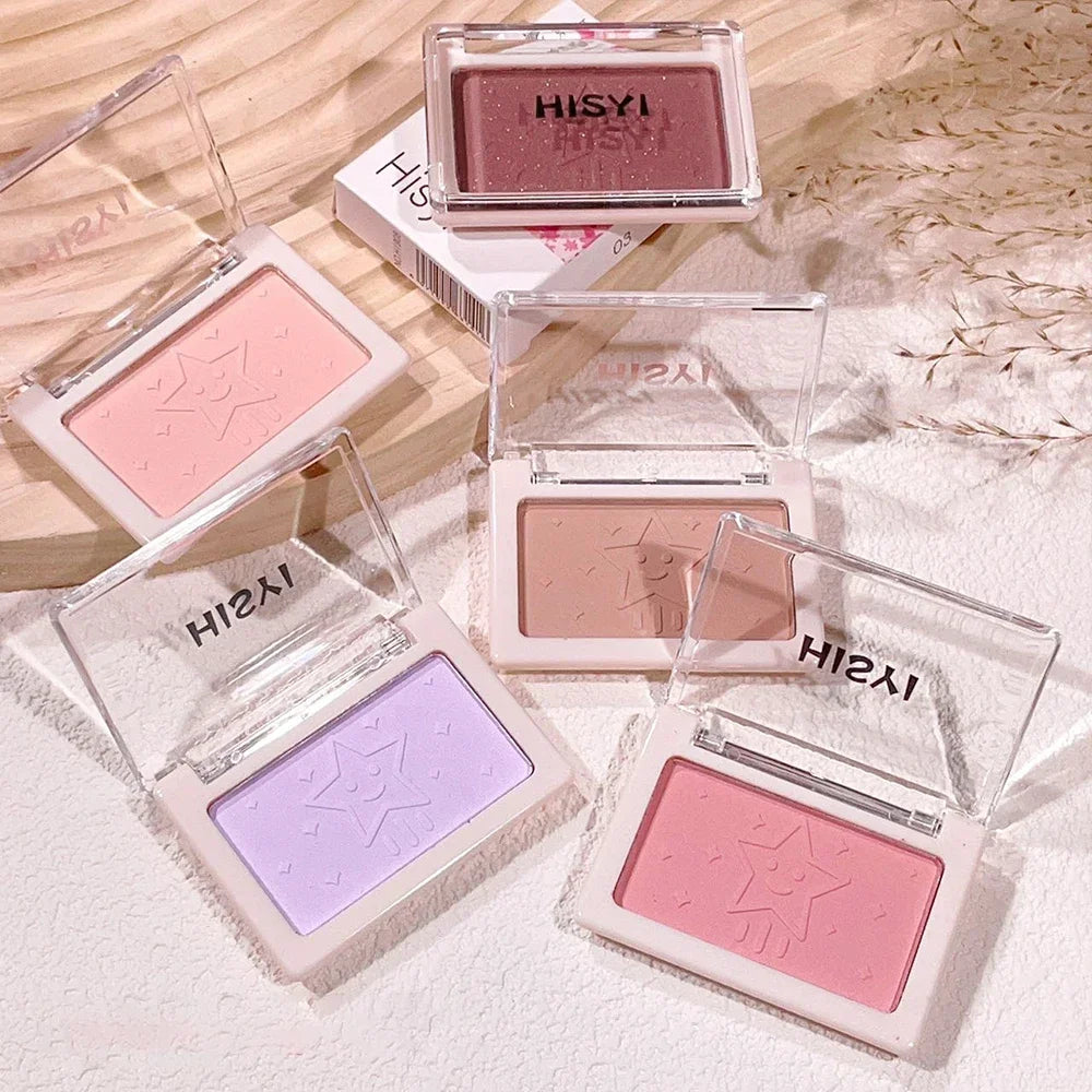 Various blush products in clear cases with 'HISIY' branding on a textured surface.