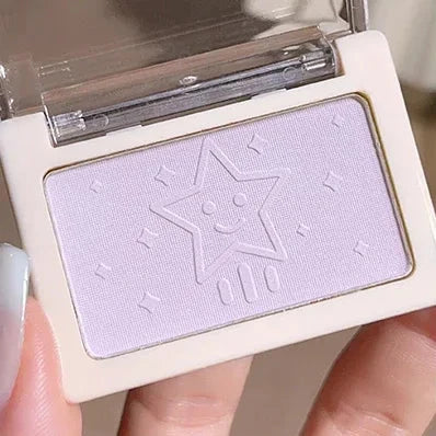 Makeup product with a star logo on a white background