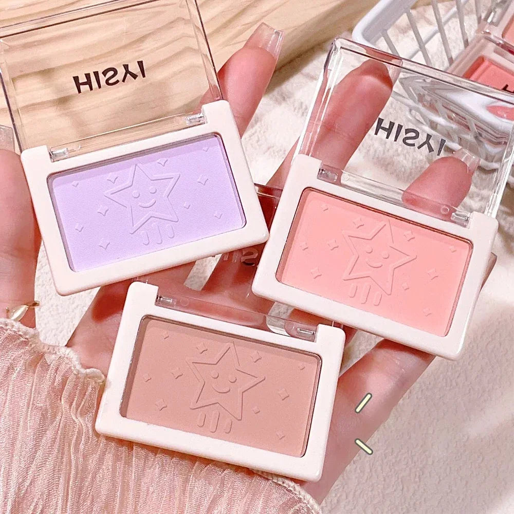 Three makeup products with star designs in open cases, featuring the brand 'HISIYI'.